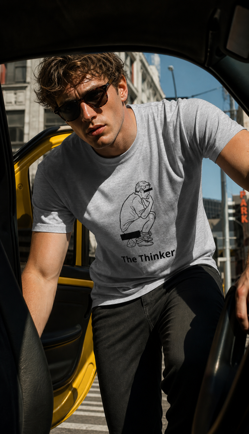 Man wearing a gray t-shirt with &